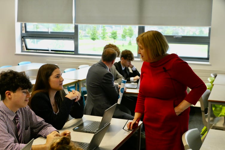 Cabinet Secretary for Education Lynne Neagle speaking to students at Caldicot School