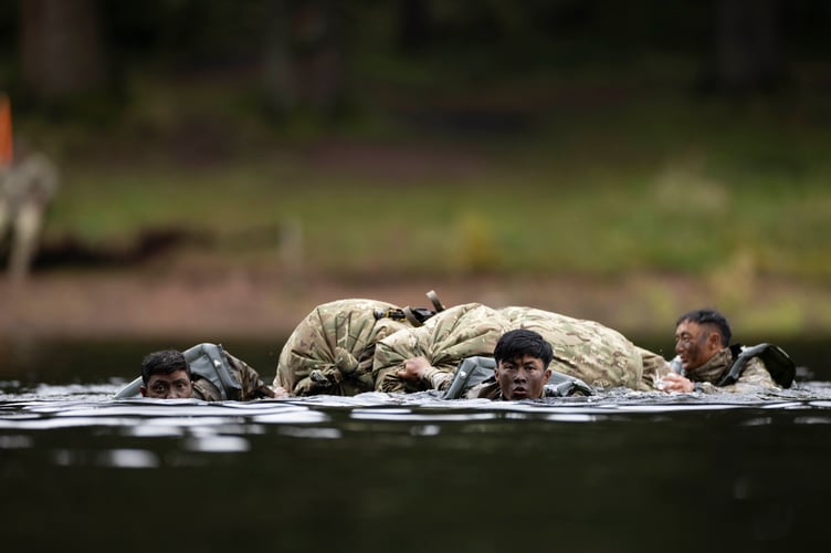 Gurkha soldiers from Gurkha Company (Sattang) crossing the river using makeshift life rafts made from their bivvy bags during EXERCISE CAMBRIAN PATROL 2024.

Soldiers from across the world are readying themselves for the ultimate challenge of military fieldcraft, navigation, tactics, leadership skills and teamwork.
This all takes place across the undulating terrain of Bannau Brycheiniog (Brecon Beacons) where Exercise Cambrian Patrol has had its roots since 1959.

Around 1,000 troops, spread across eight phases of the event, will be faced with a mock mission that includes covering more than 40 miles from east to west, dealing with enemy threats and various other challenges.

Lieutenant Colonel Will Peltor, Officer Commanding this year's event, said: ÒAs we mark the 65th year since the first Exercise Cambrian Patrol took place itÕs important to note that the event maintains its core standards and is as relevant today, in the modern operational environment, as it was for Territorial Soldiers nearly seven decades ago when they were being tested on their Cold War readiness.
