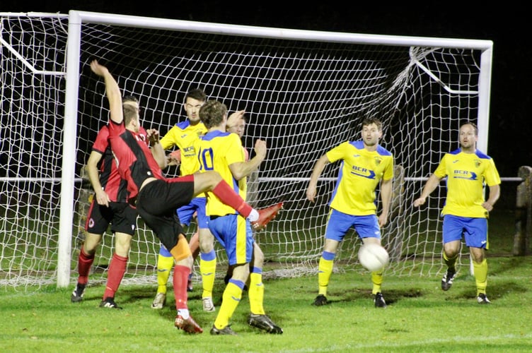 Goalmouth action as Goytre attack the Corries goal