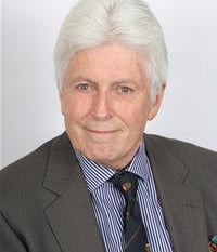 Abergavenny councillor tunes into meeting while driving to funeral