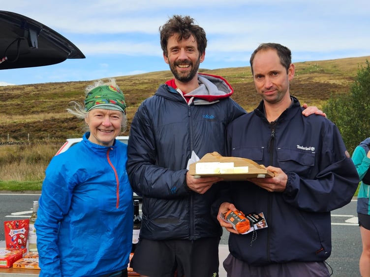 Wyndham Turner, right, receives the Welsh Fell Series award