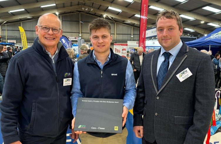 Pictured is NFU Cymru Dairy Board Chairman Jonathan Wilkinson, with Dairy Stockperson of the Year award winner for 2024, William Davies, and NFU Cymru/NFU Mutual Group Secretary, Rhys Williams.