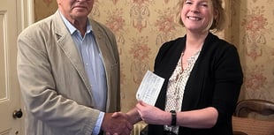 Fundraising group hands over charity cheques