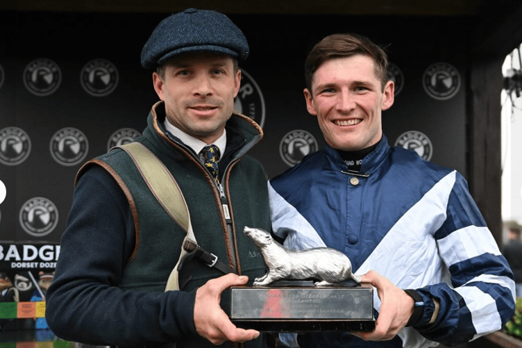Sam Thomas and Callum Pritchard celebrate with the Badger Beer trophy