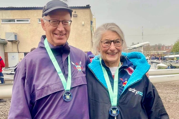 John Benson and Frances Lester celebrate their doubles win at Stourport