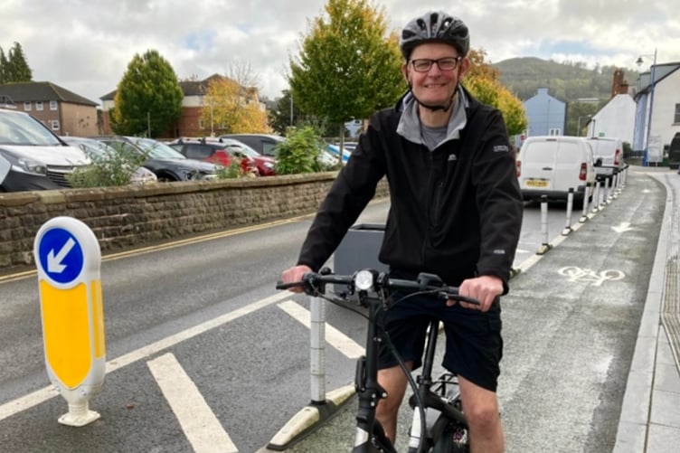 Daniel Morden turns the pedals to tell his tales, using an e-bike
