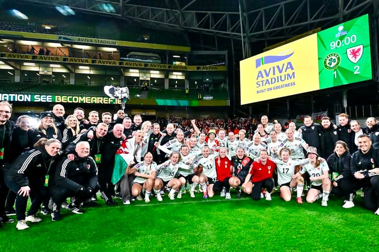 The Wales squad celebrate qualifying for the 2025 Euros 
