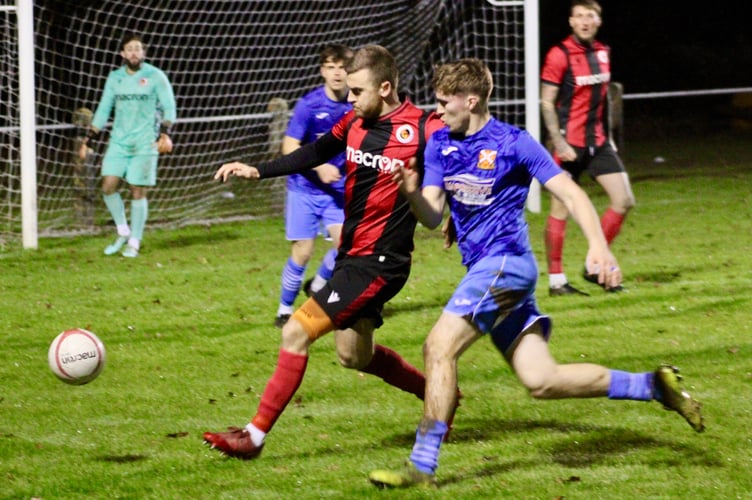 Players challenge for the ball in the Goytre v Abergavenny derby