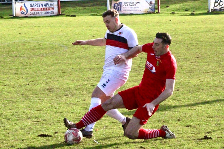 A tough battle for the ball during the Corries v Goytre game  