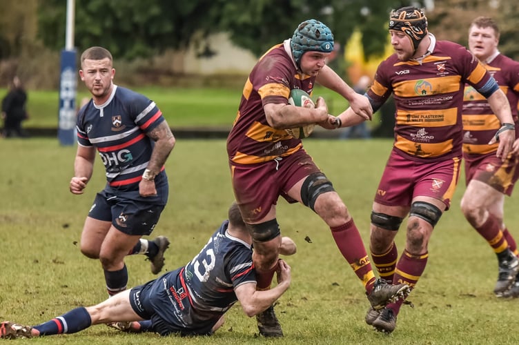 An Aber player drives forward in the 73-29 win over Senghenydd