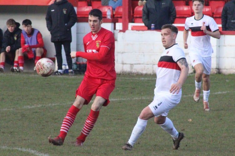 Goytre, in white, had to share the points at Brecon Corries after leading 2-0