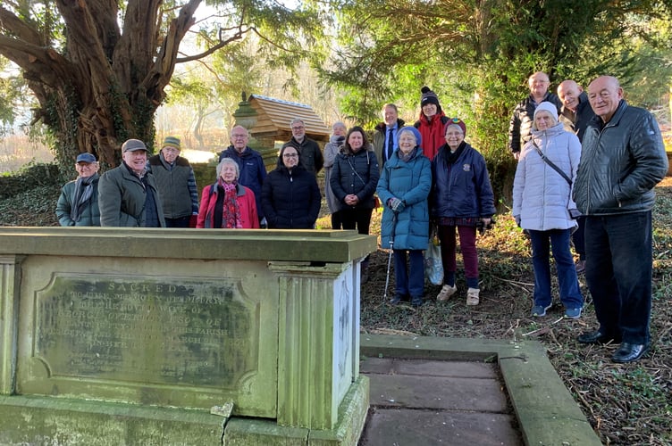 The group on the day next to George Overton’s grave in the churchyard in Llandetty