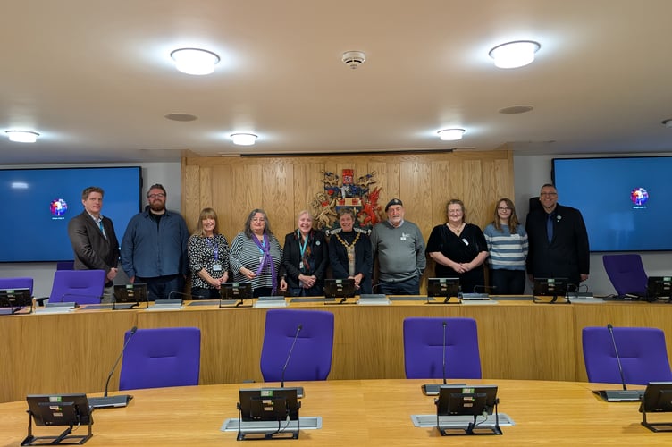 MCC and MHA officers with Cllr Angela Sandles, Cabinet Member for Equalities and Engagement, Alison Palmer, Deputy Director, GAVO, Cllr Mary Ann Brocklesby, Council Leader, Cllr Su Su McConnel, MCC Chair, Bryn Probert, Monmouthshire Veterans Support Hub Volunteer, Jenny Powell, The Gathering, Abergavenny & Morgan Collins, MonLife Youth Volunteer
