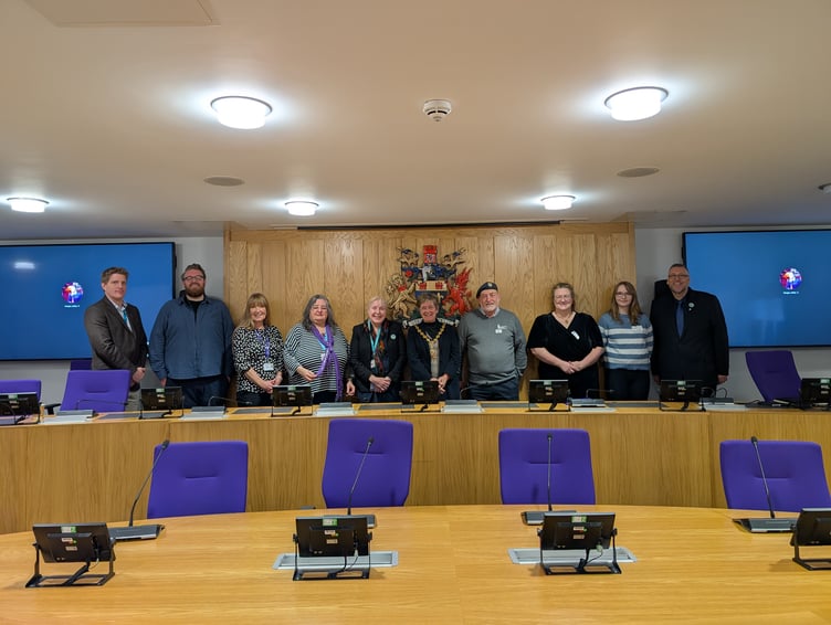 MCC and MHA officers with Cllr Angela Sandles, Cabinet Member for Equalities and Engagement, Alison Palmer, Deputy Director, GAVO, Cllr Mary Ann Brocklesby, Council Leader, Cllr Su Su McConnel, MCC Chair, Bryn Probert, Monmouthshire Veterans Support Hub Volunteer, Jenny Powell, The Gathering, Abergavenny & Morgan Collins, MonLife Youth Volunteer