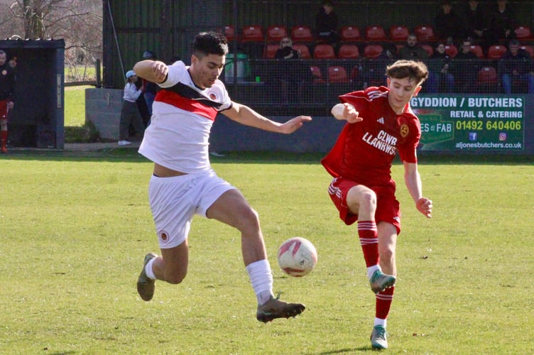 Players battle for the ball in the Llanrwst v Goytre FAW Trophy clash