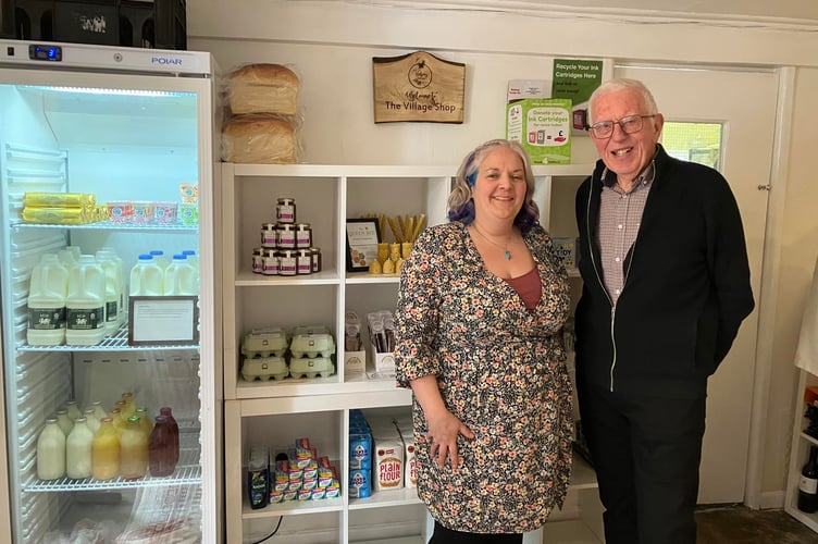 Publican Rhiannon Metters celebrates the opening of the village store with Pub is The Hub advisor Roger Belle.jpg
