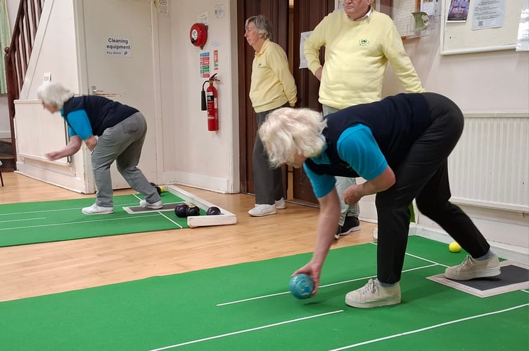 Synchronised sisters! Linda Edgar (foreground) and her sister, Margaret Pidoux, helping to secure the extra points for Dingestow.