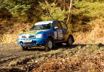 Dylan races to rally win by just two seconds