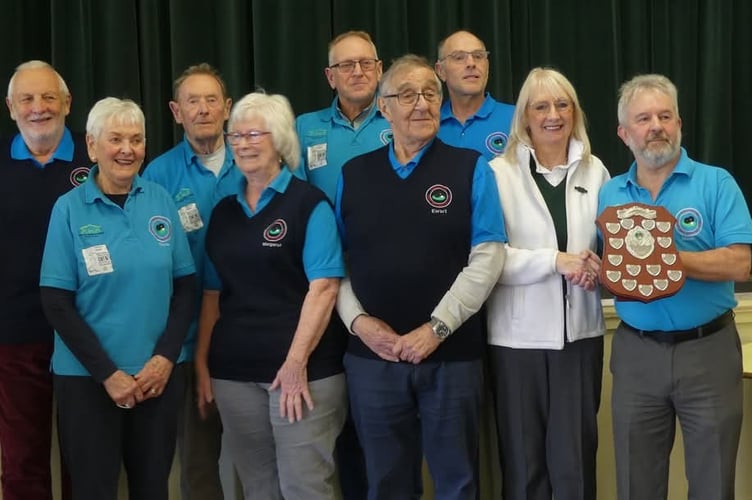League winners Dingestow SMBC receive the League Shield from League Chair, Philomena Vaughan