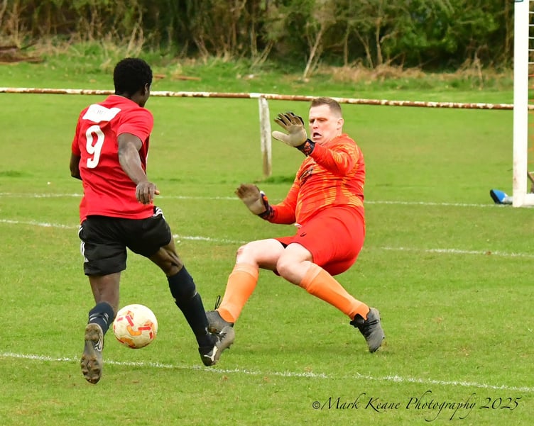Omar Bojang rounds the keeper to score the winner and send Crickhowell 2nds into the final of the Gwent Central Open Cup