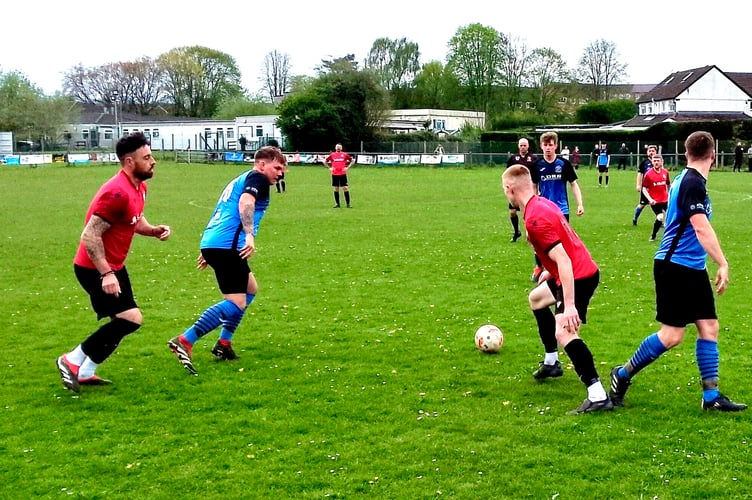 Mardy top scorers Ross Melrose and Nathan Price battle for possession.