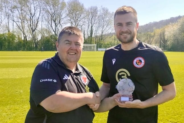 Chris Ham is presented with his award by Ardal Southern League media officer Neil Dymock. Photo: Goytre AFC