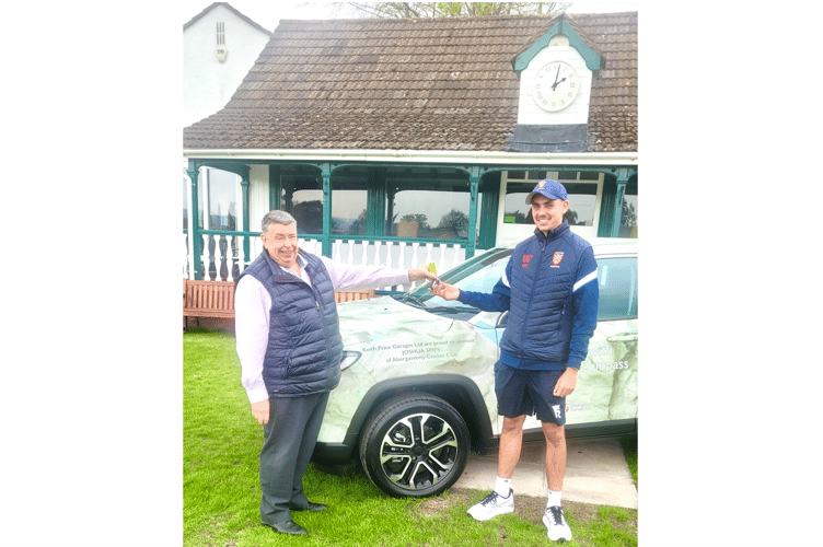 David Gait from Keith Price handing the keys to a sponsored loan car to Abergavenny CC's Josh Spies