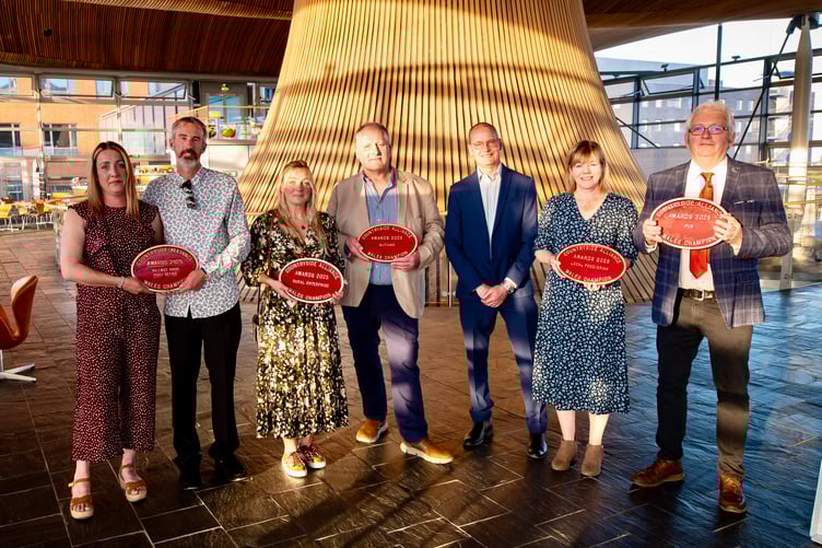 Neil James of Raglan butchers NS James proudly holds the Countryside Alliance Wales 'Butcher of the Year' award alongside other category winners at the Senedd.