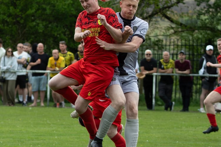 Heads you win, as players battle for the ball in the Clydach Wasps v Glascoed final