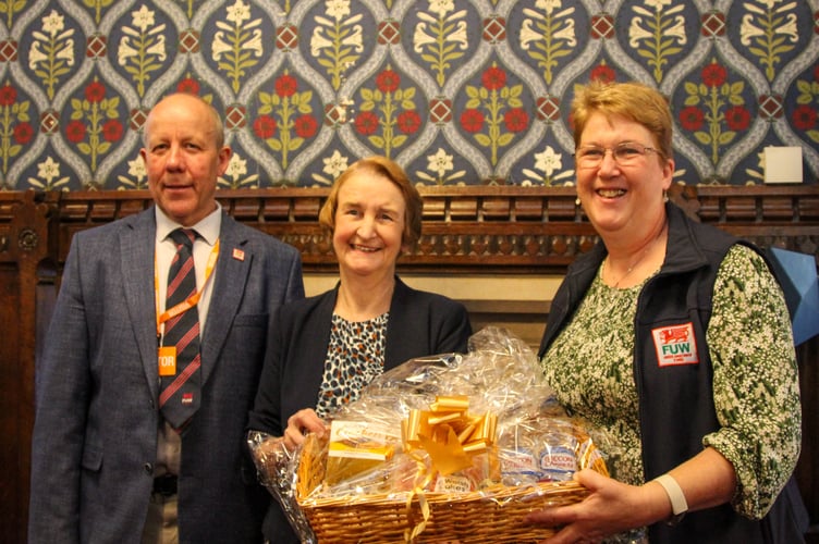  President Ian Rickman; Dame Nia Griffith MP, Minister in the Wales Office; and FUW Carmarthen Chair, and Caerfyrddin MP, Ann Davies during the 'Carmarthenshire Day' at Westminster Hall.