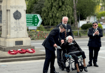 WATCH: Crowds applaud as 100-year-old D-Day veteran lays wreath at VE Day service