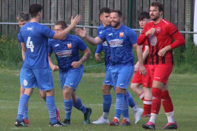 Abergavenny Town players celebrate a goal