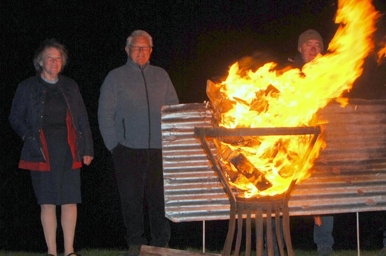 The beacon burning well. It was visible from the village below