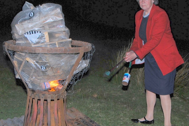 The Beacon being lit by jubilee committee member Rosemarie Harris