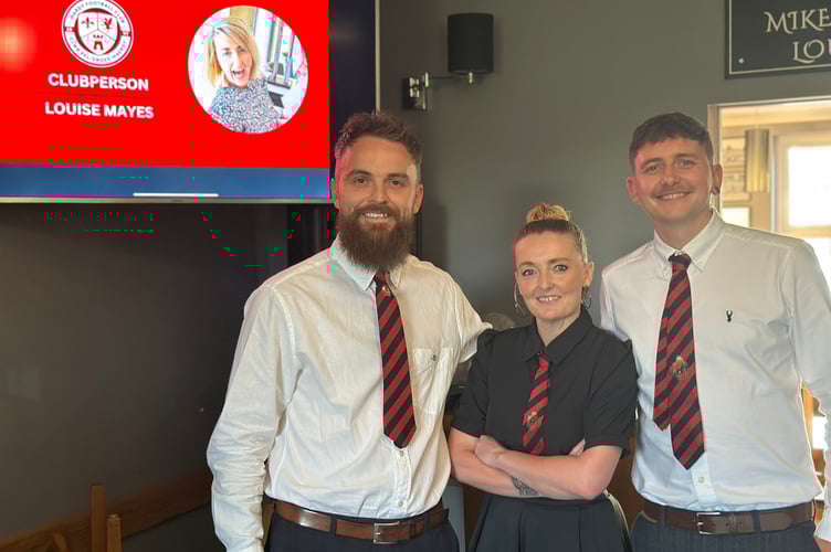 Mardy FC Clubperson of the Year Louise Mayes with club captain Matt Wham and Owen Vaughan.