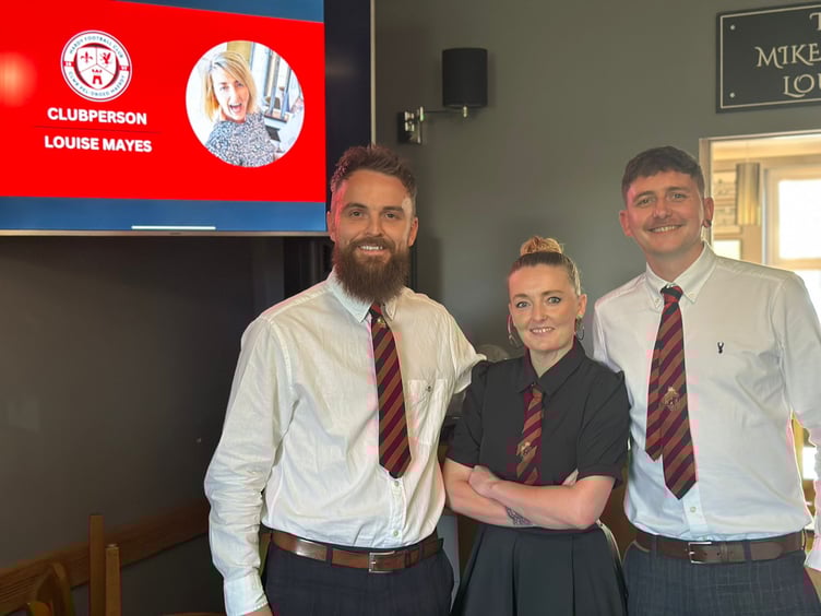 Mardy FC Clubperson of the Year Louise Mayes with club captain Matt Wham and Owen Vaughan.