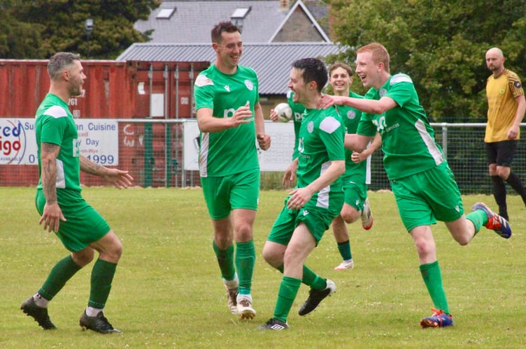 Hay players celebrate a wonder goal from Tom Gardner