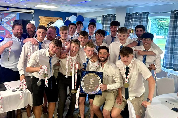 Abergavenny Town's FAW South East Reserves League winners celebrate with the trophy and medals at the club's annual awards night