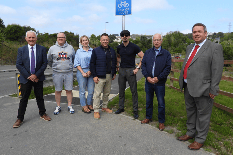Blaenau gwent councillors pose at the site of improved active transport links in Brynmawr