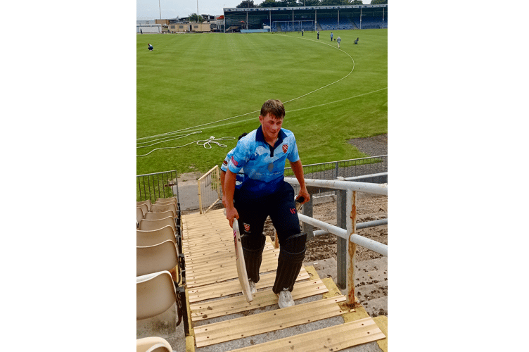 Ryan Avery makes his way up the famous St Helen's steps after firing 137 