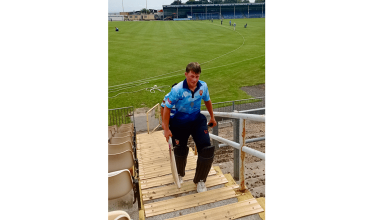 Jack Ryan makes his way up the famous St Helen's steps after scoring 118