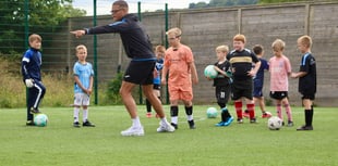 Kids get a big kick out of award-winning summer football camp