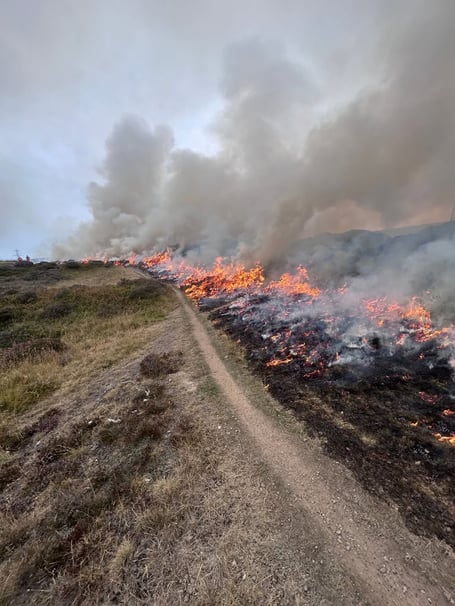 Firefighters are still fighting a wildfire that has been burning for four weeks near Brynmawr. Photo: South Wales Fire & Rescue