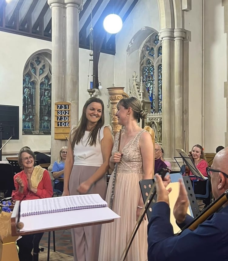 Local soloists Isabelle Harris and Emily Harris