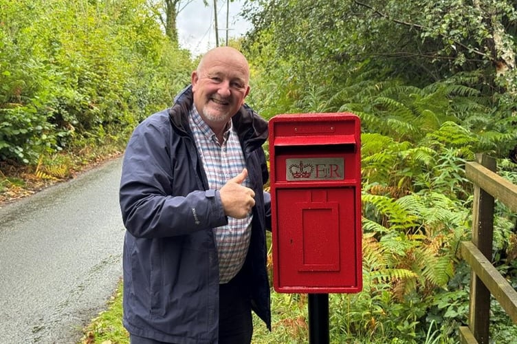 Peter Fox stood next to the new post box near Gilwern.