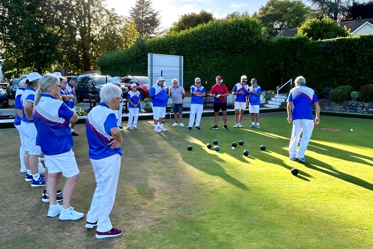 Ross Owen explains the finer details of bowling to Abergavenny members