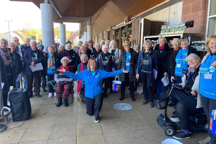 during a Christmas event at Waitrose, Llanfoist, the Abergavenny Tenovus Choir who will take part in a December 13th concert at Llanarth Village Hall.
