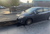 Car ploughs into bench outside popular town centre pub