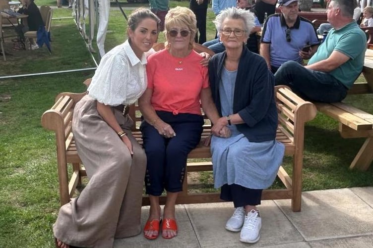 Maureen Thomas, Louise Price and Jacqueline Hamer sat on the Ray Hamer Memorial Bench
