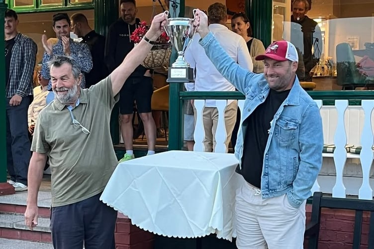 The two captains Andy Timpson and Simon Price share the Critics Corner trophy
